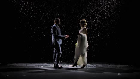 romantic wedding couple in winter snow