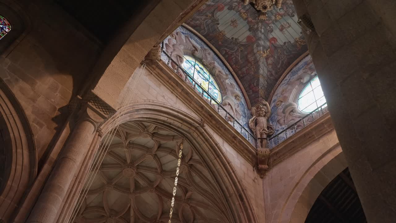 Upward view of ornate Sé de Braga cathedral ceiling in Portugal