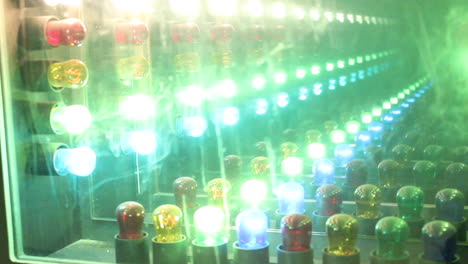 Lights-at-Carnival-Game-Show-With-Different-Colors-Flash-On-and-Off,-Depth