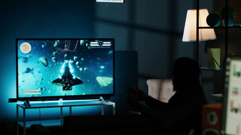 guy feeling lucky playing online gaming tournament on smart tv