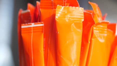 orange pouches close up