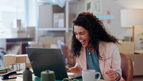 Woman,-winning-on-laptop-and-logistics