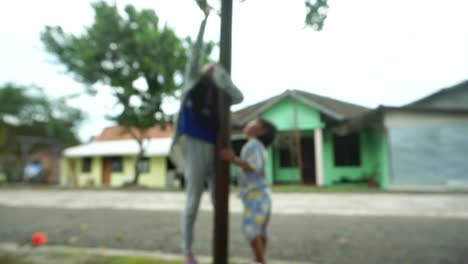 defocused or blur video of two children play together