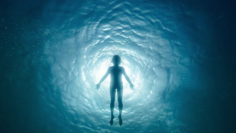 a mesmerizing journey through a serene underwater vortex, where light and water intertwine, creating a captivating visual of tranquility and exploration beneath the surface