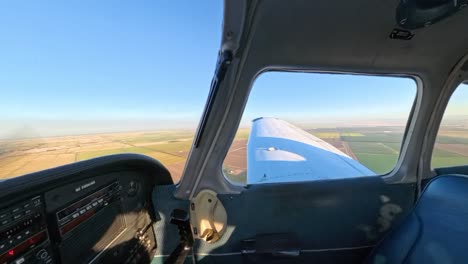 Golden hour flight in a general aviation aircraft over Northern California’s fields. Stunning rural terrain meets vibrant skies in this scenic sunset captured from above