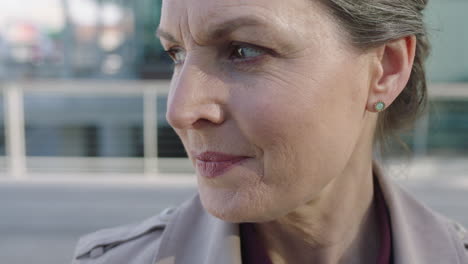 close up portrait of serious mature business woman  focused intense turns head looking confident determined ambitious female leader