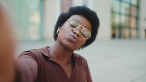 young african woman smiling at camera