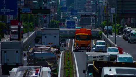 a timelapse of the traffic jam at the urban street in tokyo long shot