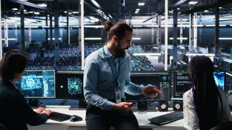 manager supervising woman in data center coding with generative ai