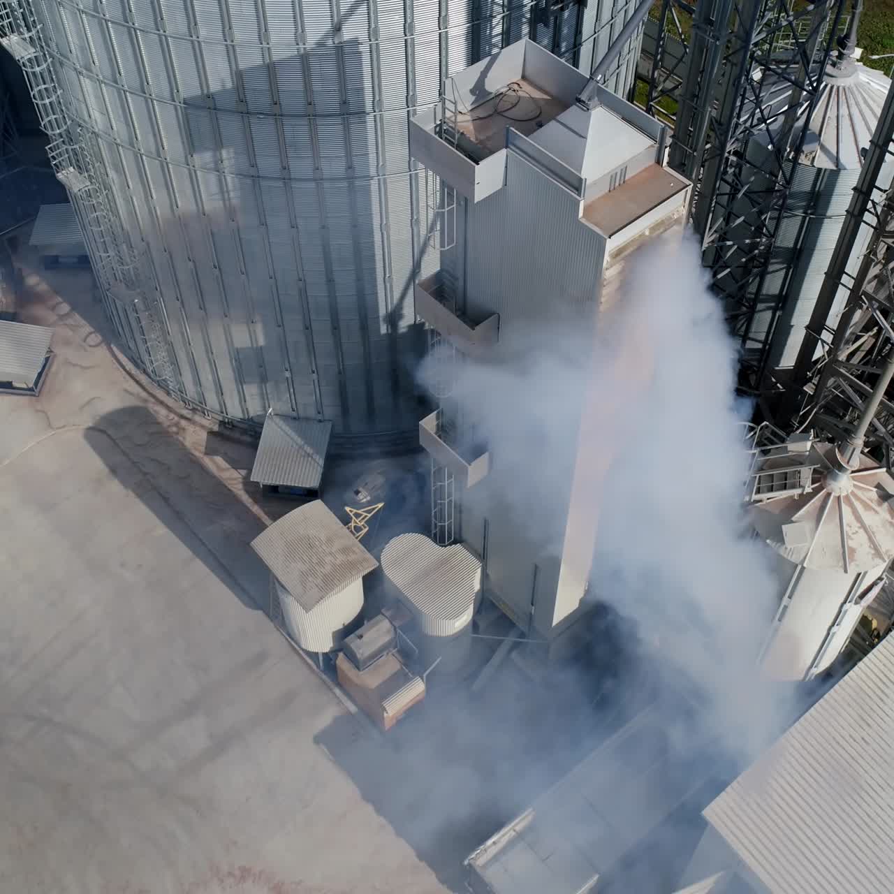 Big elevator metal construction. Modern industrial grain elevators. Aerial view