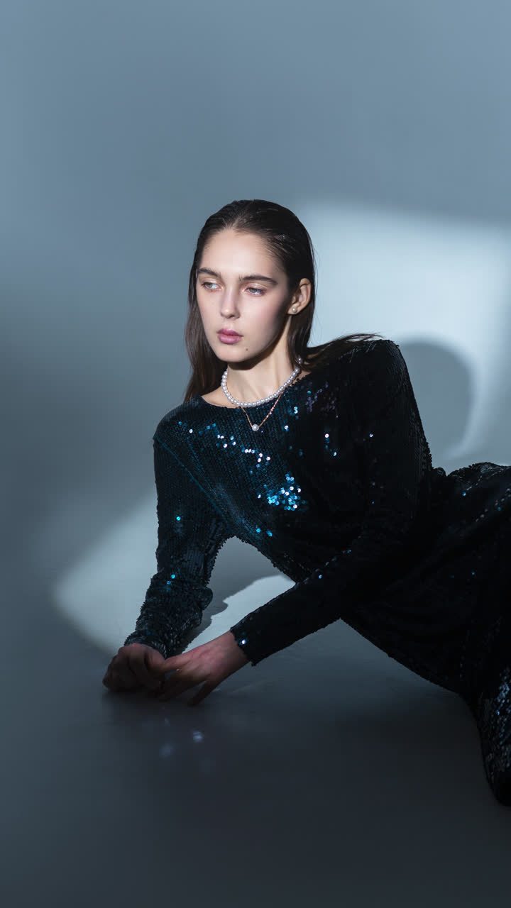 Fashion New Collection Featuring a Woman in a Sequined Dress