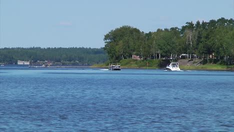 Boating-on-the-Bouctouche-River-near-Sainte-Marie-de-Kent-in-New-Brunswick,-Canada