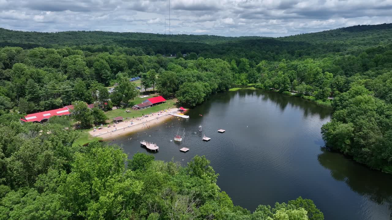 Mt. Gretna Lake and Beach at Lake Conewago. Aerial establishing shot of popular summer swimming spot in Pennsylvania.