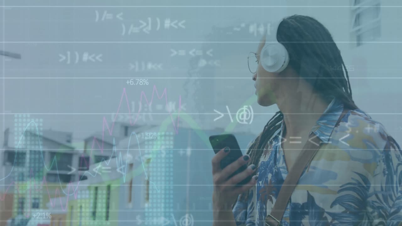 Animation of graphs, symbols, biracial man listening to music on cellphone wearing headphone