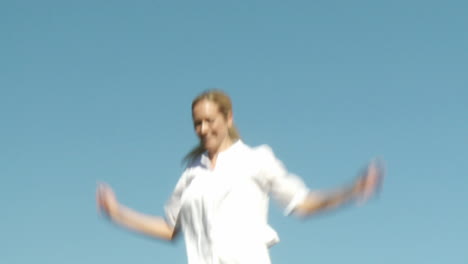 Attractive-Woman-jumping-on-a-trampoline