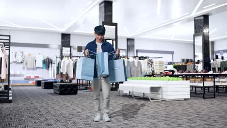 man shopping in a modern clothing store