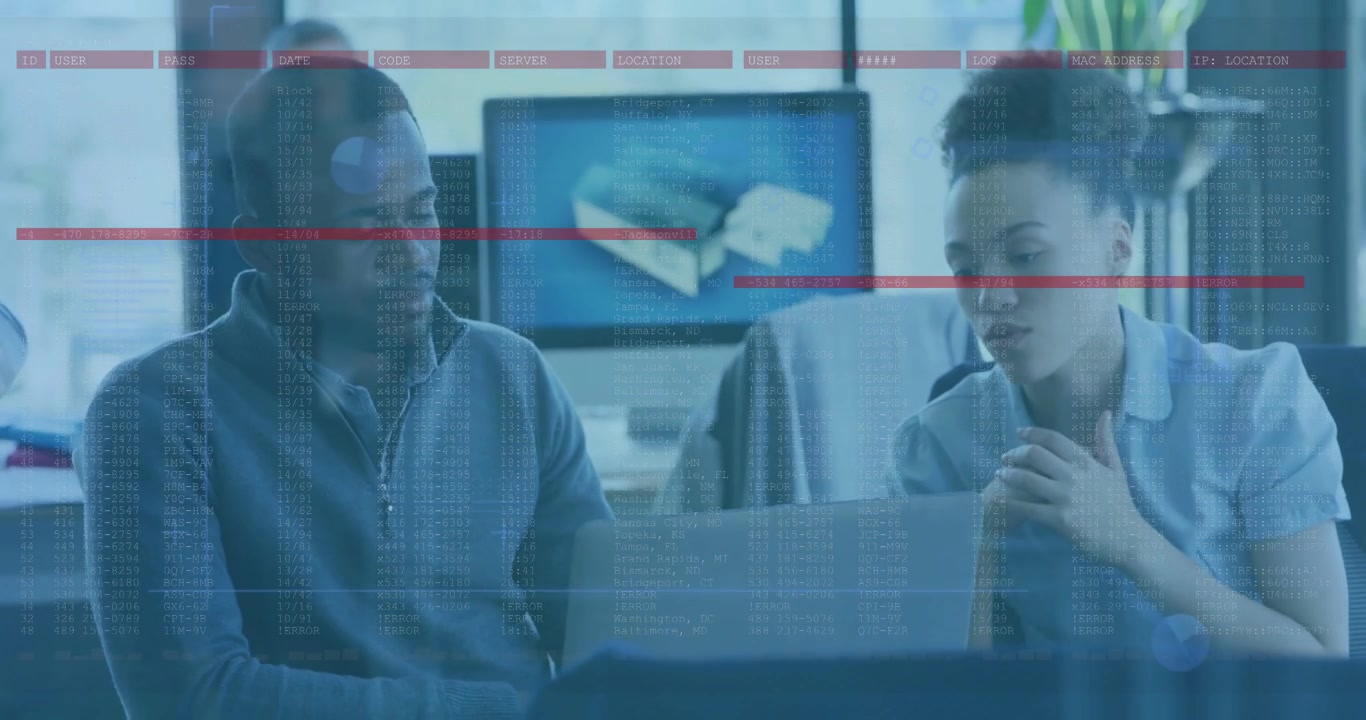 Diverse coworkers following woman's pointing, reviewing laptop at desk, overlay showing USB graphic