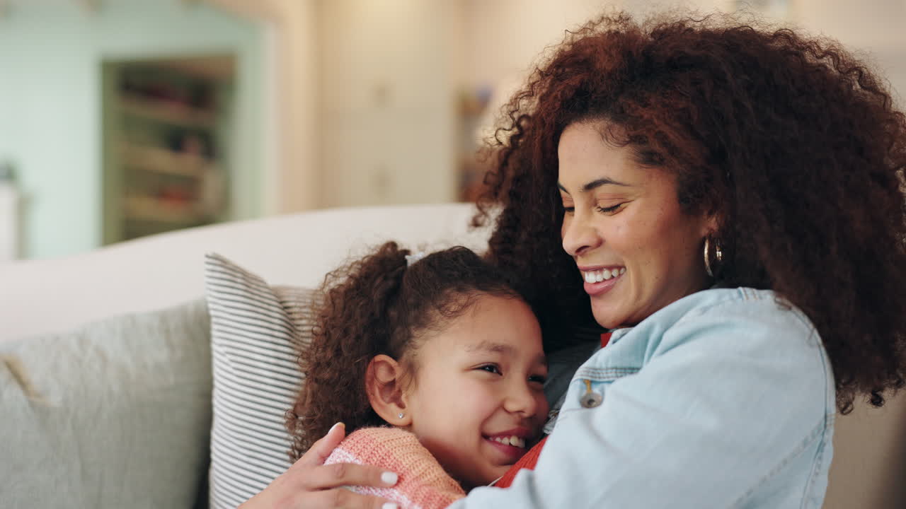 Mother and daughter embracing
