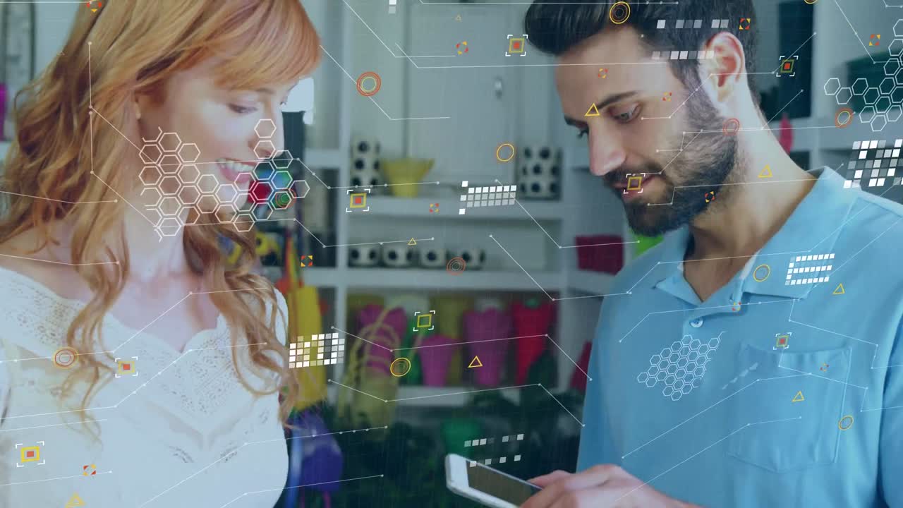 animación de iconos y conexiones sobre feliz mujer diversa y hombre usando terminal de pago