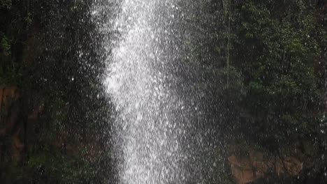 Crocodile-river-waterfall-flowing-and-falling-over-rocks-at-the-walter-sisulu-national-botanical-gardens-in-roodepoort,-South-Africa