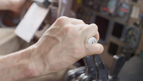 Airplane-pilot-in-the-cockpit,-taking-off,-suing-the-throttle