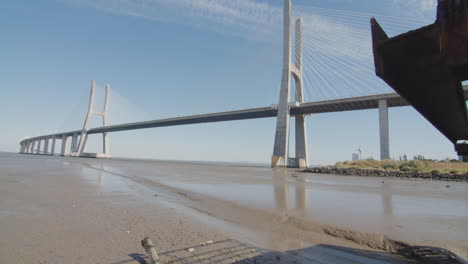 vasco da gama bridge in lisbon, portugal. rusty structure