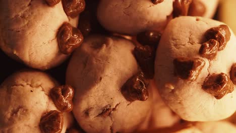 close-up of pink cookies with chocolate pieces