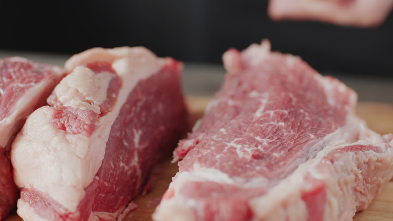 Cutting Raw Meat with Knife