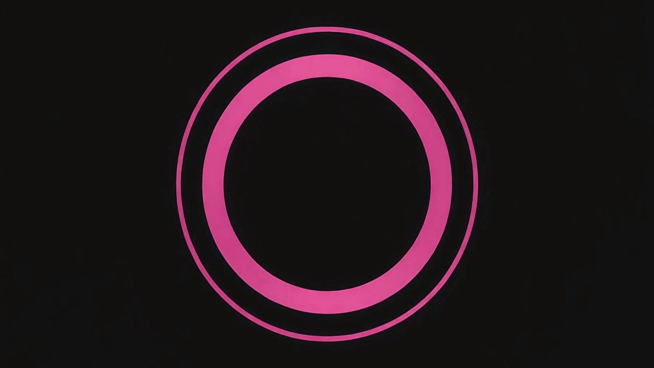 Cerchi concentrici rosa astratti pulsanti su sfondo nero