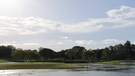 time-lapse of a lake from morning to evening