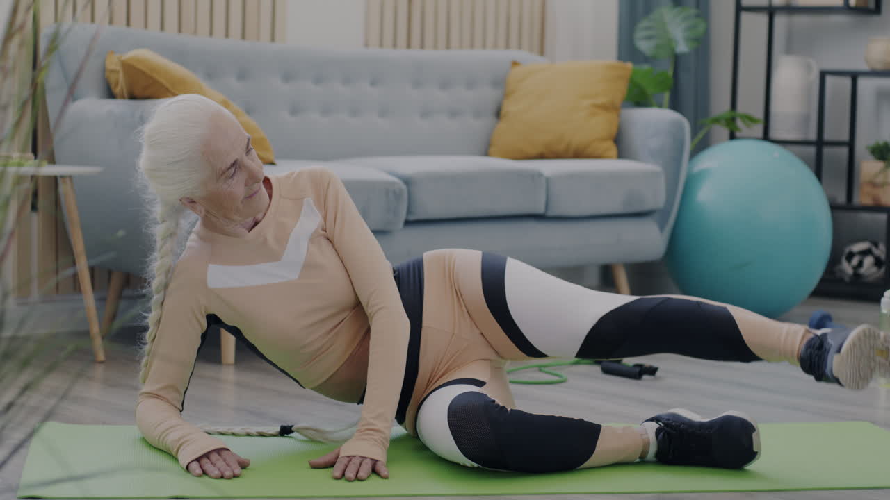 Senior Woman Doing Leg Raises at Home