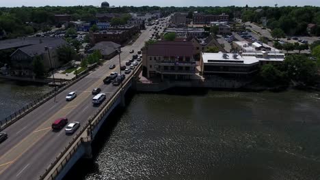 aerial view, bridge and street traffic in geneva il usa on sunny summer evening