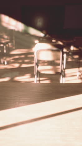 empty classroom with sunlight streaming in