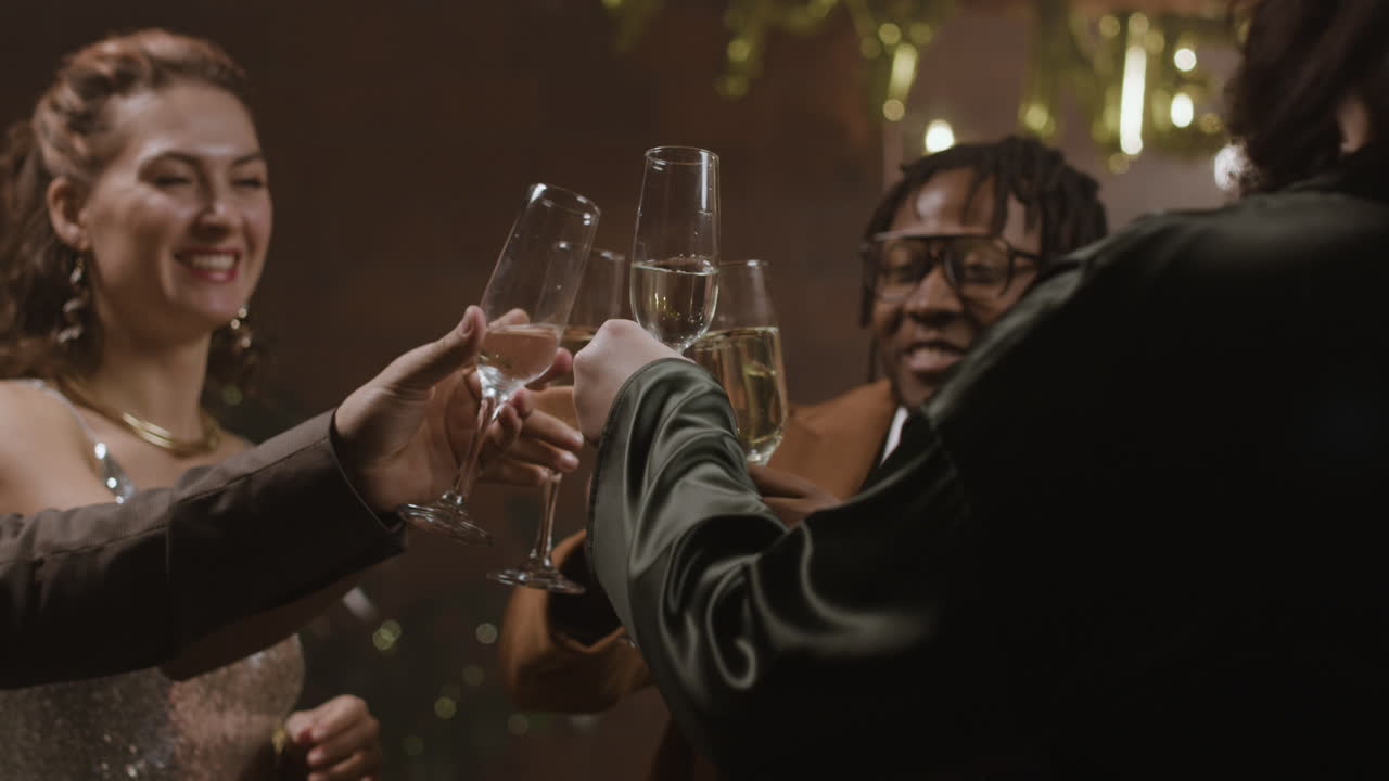 Friends toasting champagne at a New Year's party