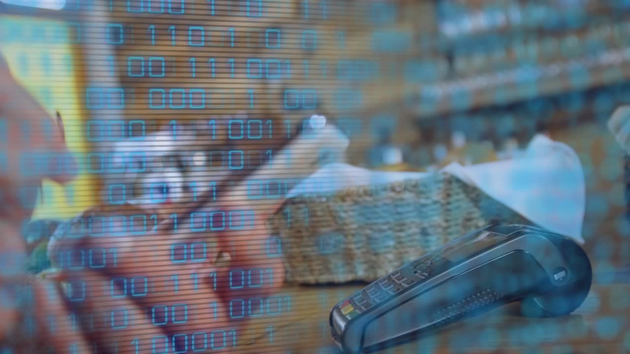 Male customer tapping smartphone over card reader making contactless payment with binary overlay