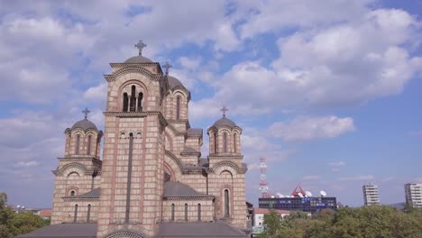 Slow-ascending-aerial-shot-of-St-Mark-Church-in-summer-day