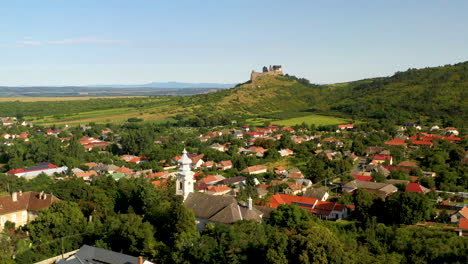 rotating cinematic drone shot of the boldogkő castle in hungary