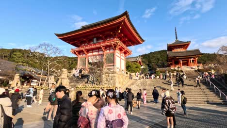 tourists in kimonos explore a historic shrine