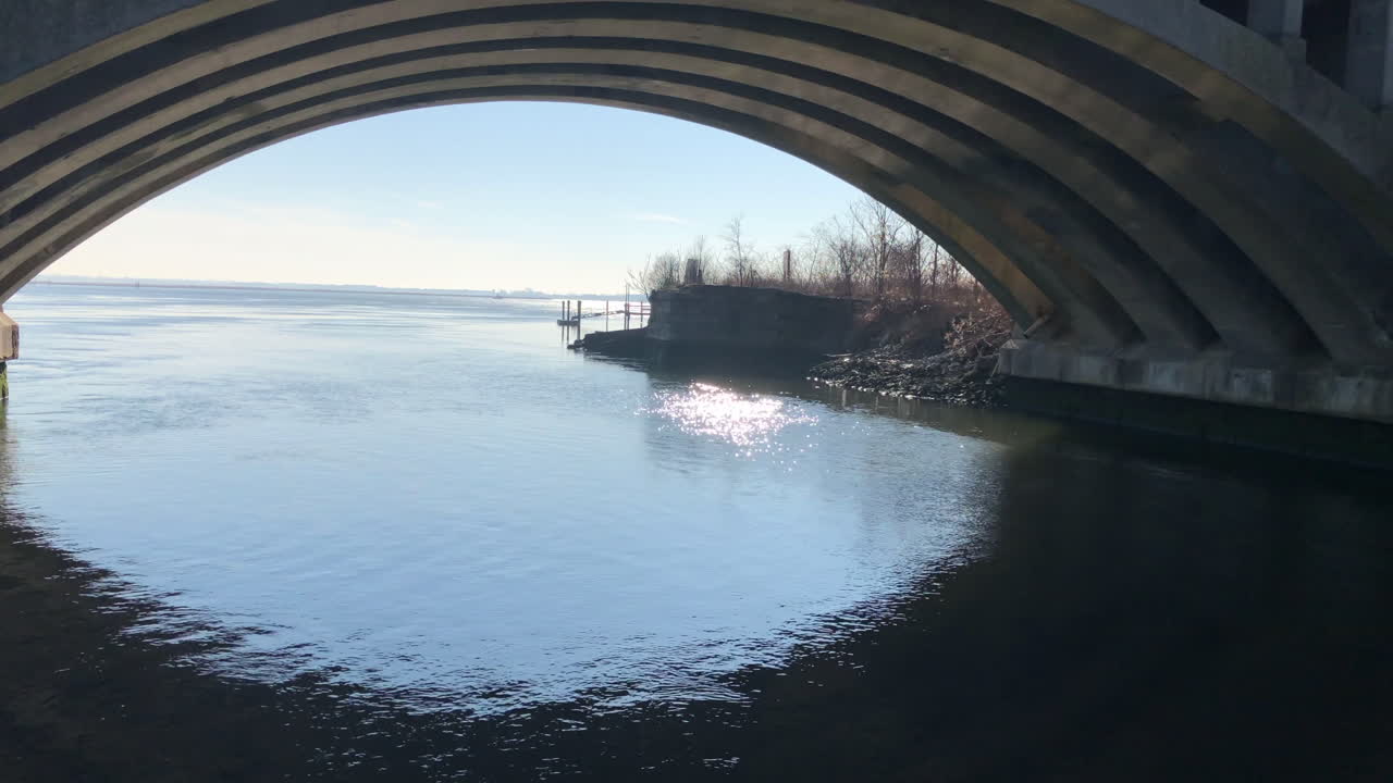 zoom in of a bridge off a pier