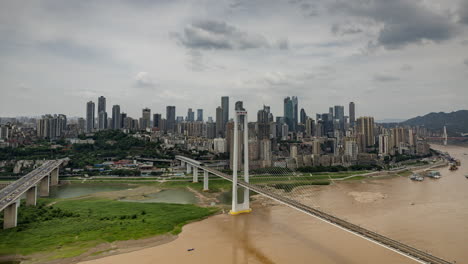 timelapse of the amazing chongqing cyberpunk city skyline from a high vantage point wirh the yangtze river