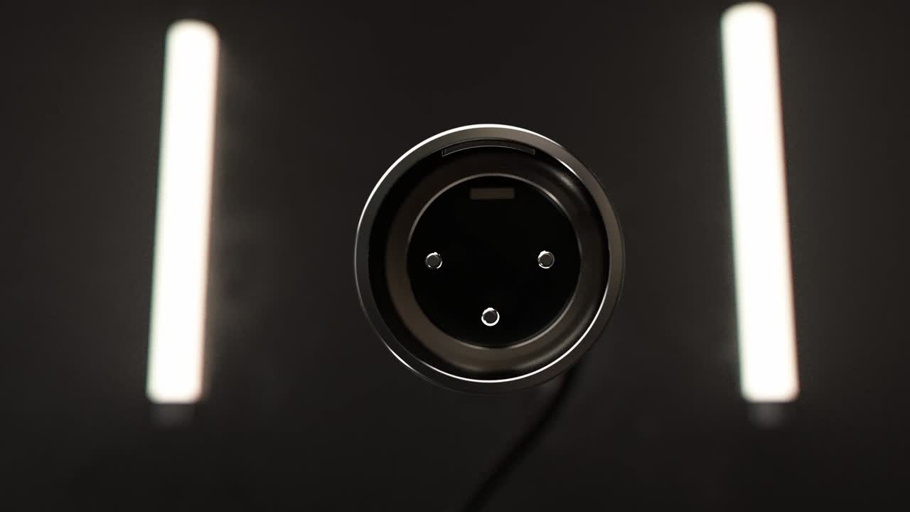 XLR Audio Connector Rotating on a Dark Studio Background