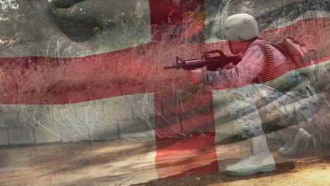 animation of flag of england over caucasian male soldier with weapon