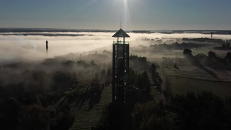 Drone-aerial-view-of-Birstonas-observation-tower,-Lithuania