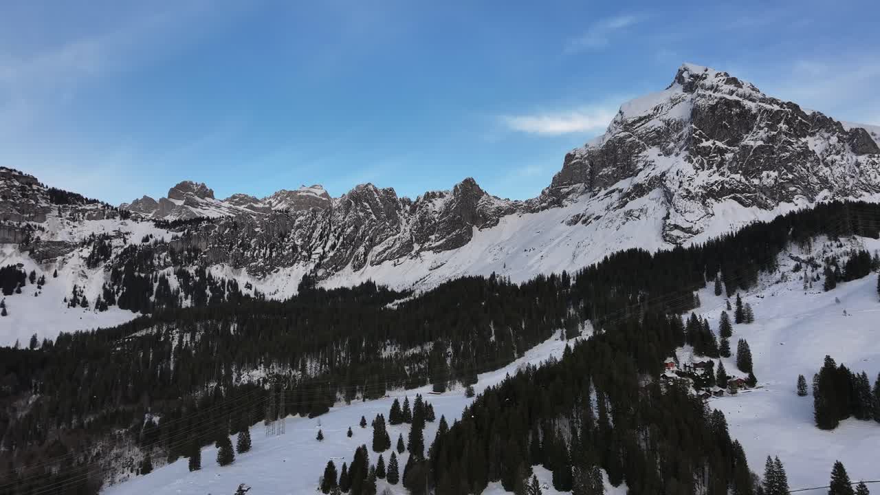 Drone approaching Fronalpstock mountain in Glarus Nord, Switzerland
