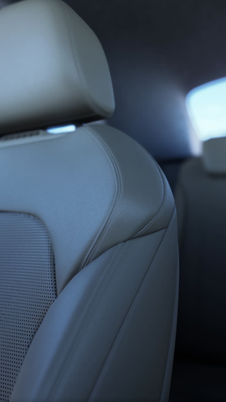 primer plano de un asiento de coche de cuero beige