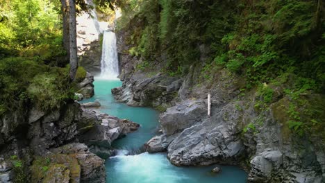 Aerial-orbit-view-of-Mamquam-Falls,-BC,-Canada