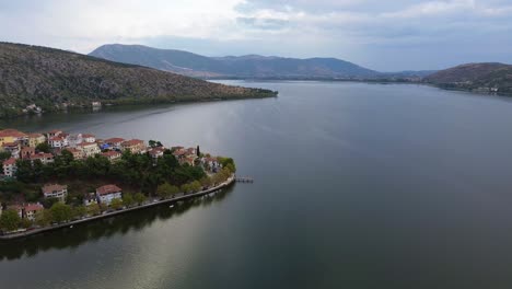 kastoria, greece in full daylight glory: a drone's view over the lake and cityscape