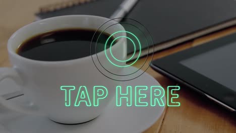 Animation-of-tap-here-over-coffee,-tablet-and-notebook