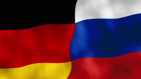 german and russian flags waving in the wind