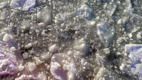 Ice-Floats-In-Frozen-Water-Of-Bothnian-Bay-During-Winter-In-Lapland,-Finland